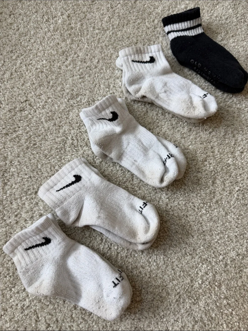 Nike White Ankle Socks w/ Black Swoosh - 4 Pack and 1 pair old navy black socks
